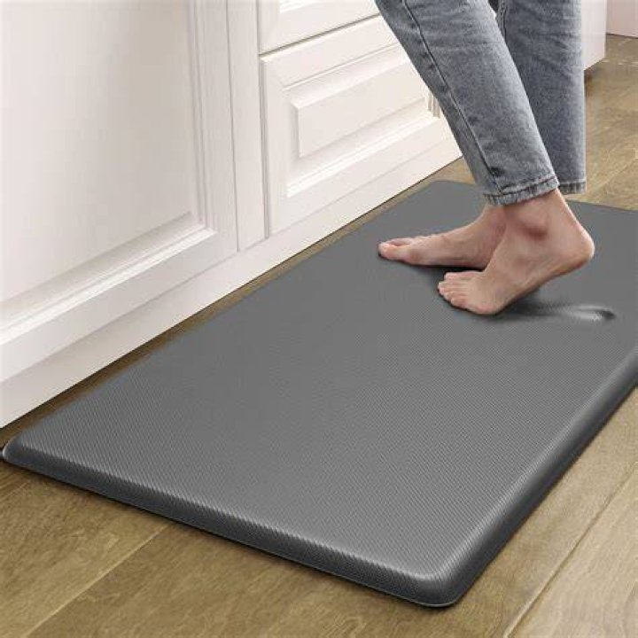 How do you clean rubber kitchen mats