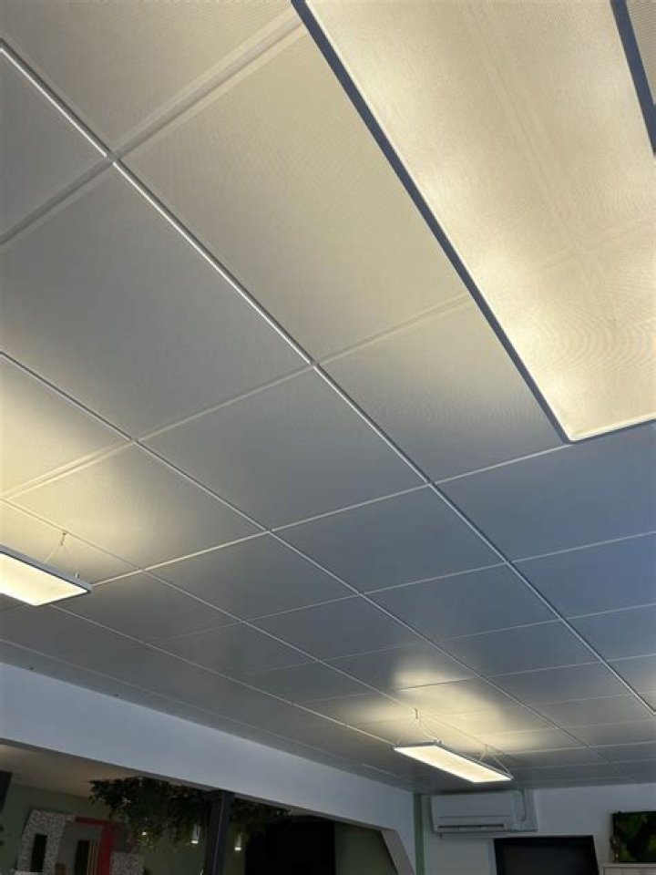 How do you cut tegular ceiling tiles