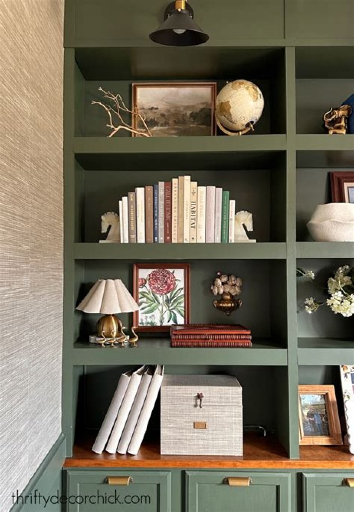How do you decorate a large bookcase