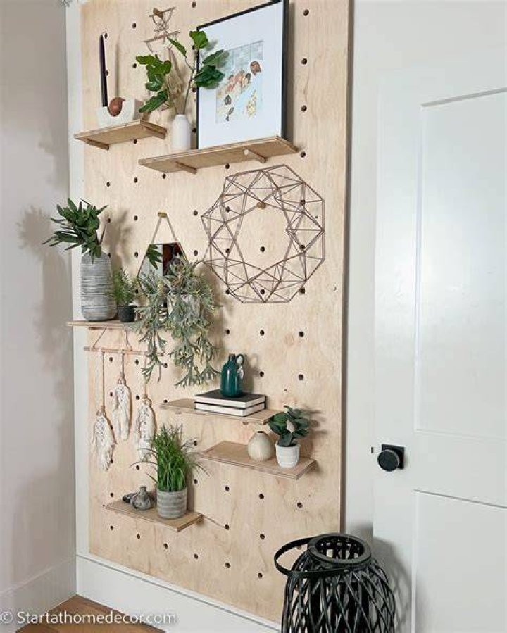 How do you hang pegboard on the wall